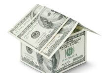 올해도 1주택자 세부담 완화…공정시장가액비율 43~45% 유지 a house made out of money on a white background