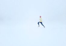 면역력 증진을 위한 생활 습관 개선 방법 person wearing yellow jacket and black pants