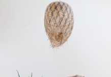 필라테스, ‘균형 잡힌 라이프’로 이끄는 건강 트렌드 woman in pink one piece swimsuit kneeling on floor