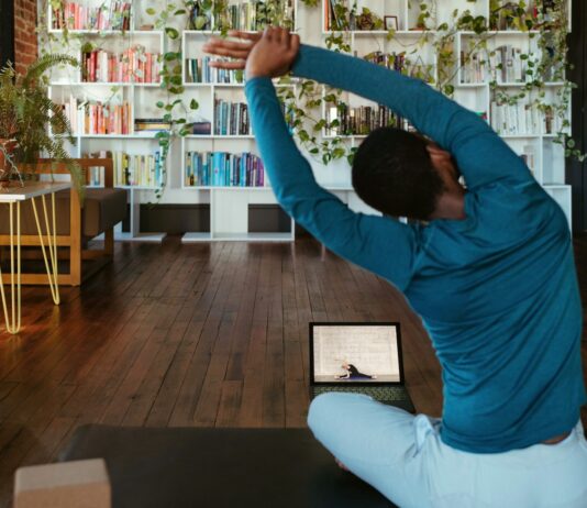 여성 건강관리, 균형 잡힌 생활 습관이 핵심 a man doing yoga in a living room